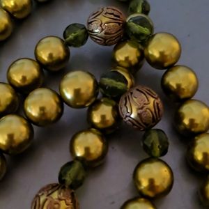 Long green beaded necklace